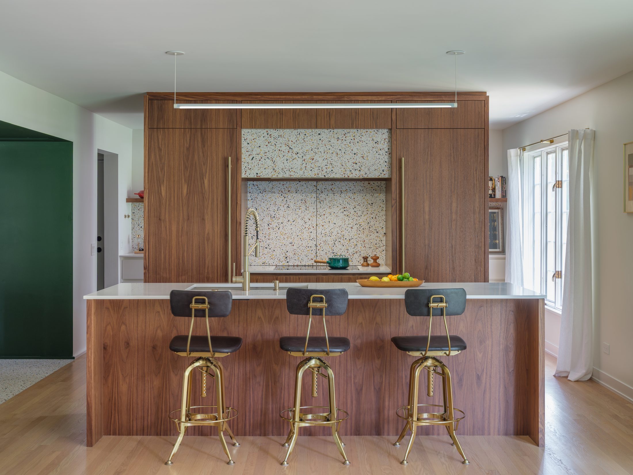 The Aberdeen Residence — walnut kitchen at the heart of the home