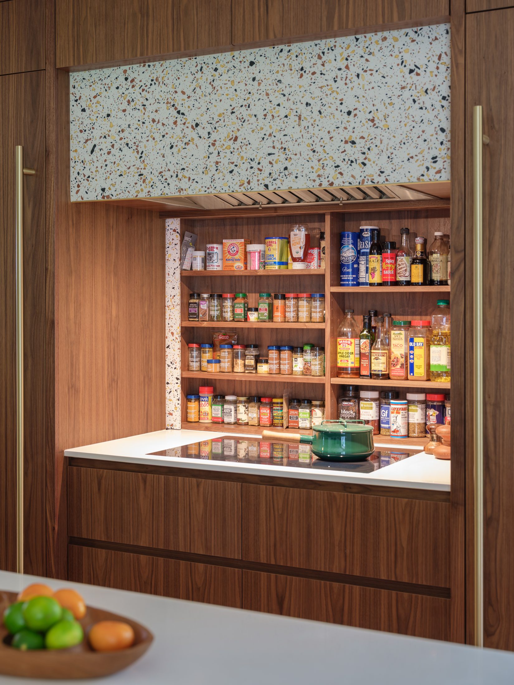 The Aberdeen Residence — terrazzo sliders open, revealing the concealed spice shelf