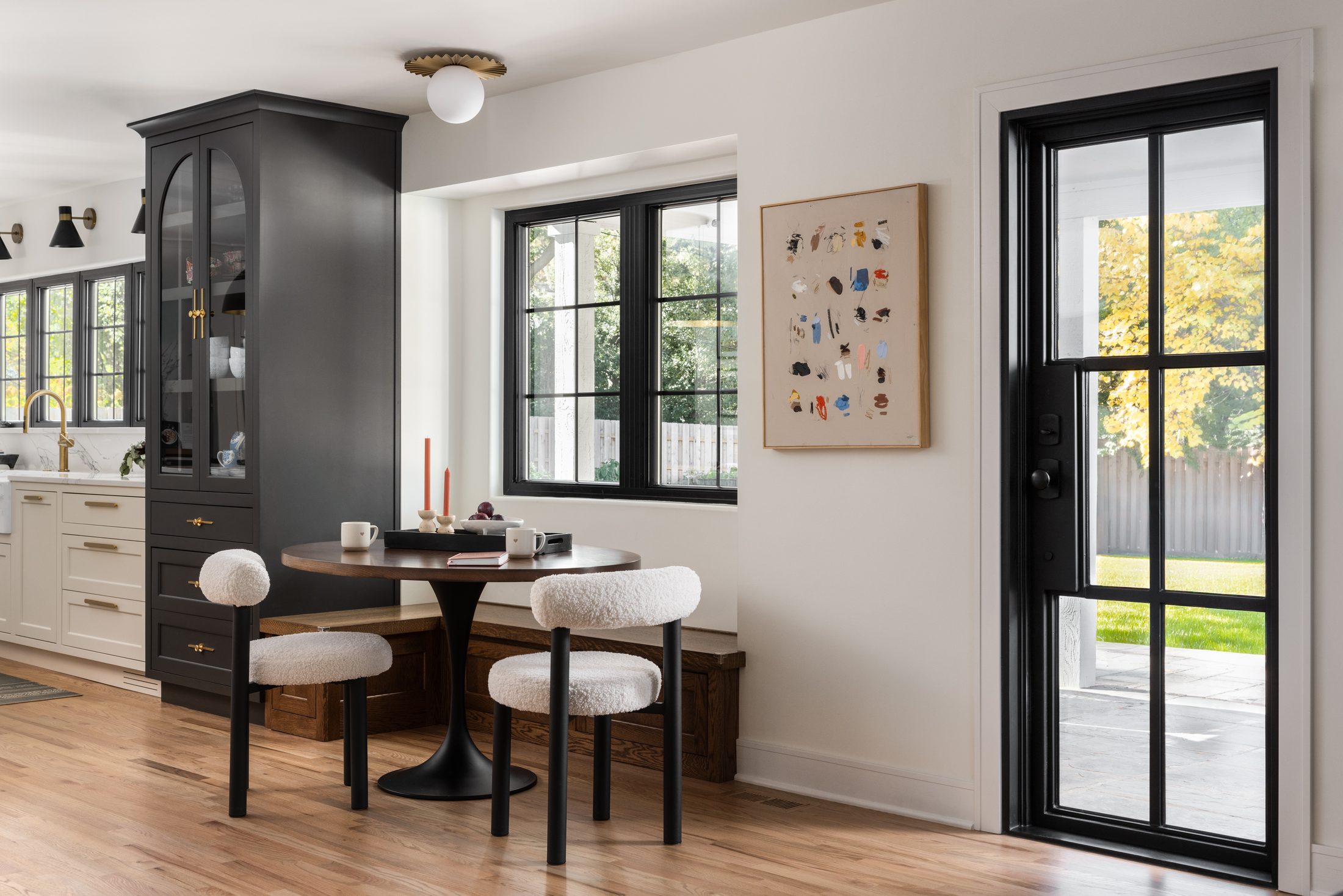 Vision in The Village — breakfast nook and steel door